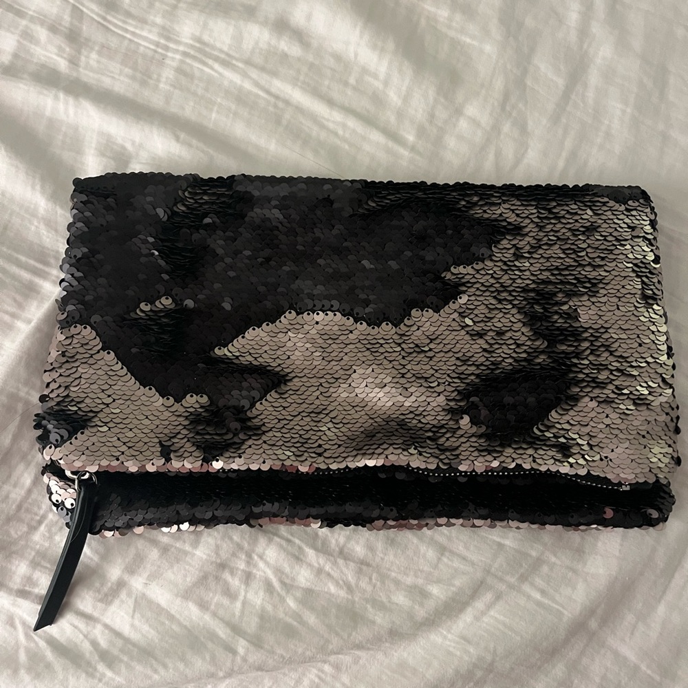 Never used black sequins clutch